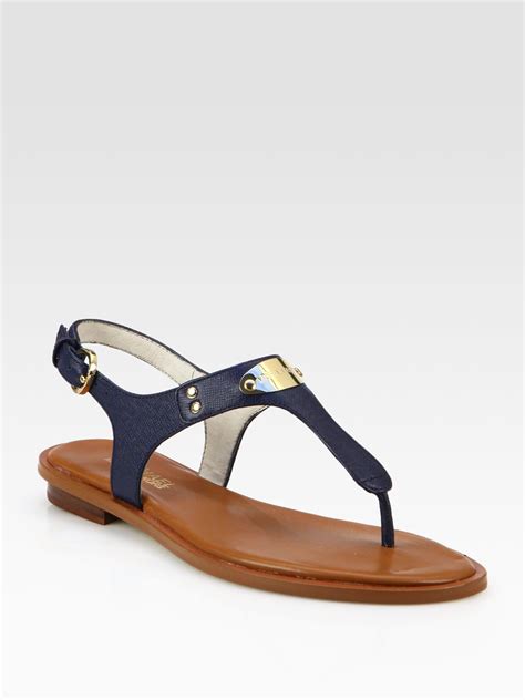 michael michael kors women's mk plate thong sandals|Michael Kors block heel sandals.